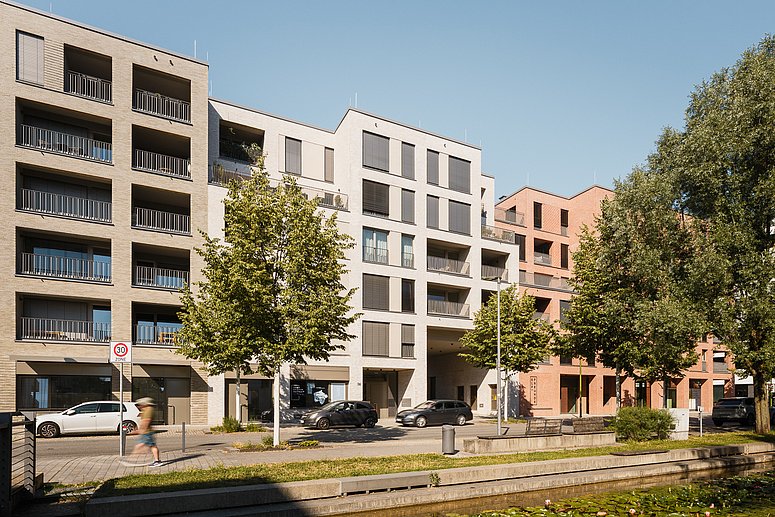 Mit ELF FREUNDE ist ein gemischt genutztes Quartier aus elf Wohnhäusern und einer gemeinsamen Mitte entstanden.